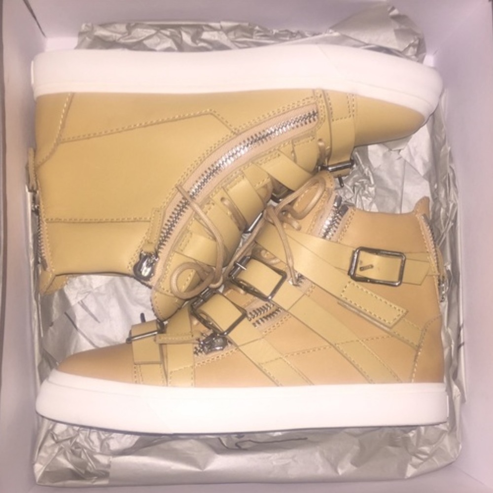 Giuseppe Zanotti leather triple buckle sneakers.